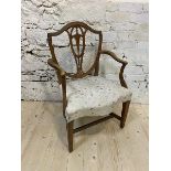 A 19thc Scottish shieldback armchair, the pierced splat over a later upholstered floral seat, on