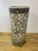 A modern china umbrella or stick stand, the cylindrical body with floral and bird decoration on