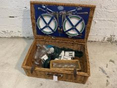 An Optima picnic basket, retailed by John Lewis, includes plates, knives, forks, cups, wine