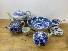 A collection of blue and white china including a 19thc transfer printed teapot which measures 16cm