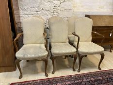 A set early 20thc Queen Anne style walnut dining chairs including four side and two carvers,