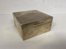 A 1956 Birmingham silver cigarette box, measures 4cm x 9cm x 9cm