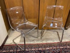 A pair of Ikea Tobias clear acrylic chairs, each measures 83cm x 47cm x 51cm
