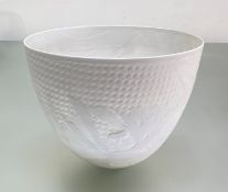 Arne Ase (Norwegian, b. 1940), a porcelain transparent high bowl, decorated in low relief with