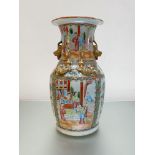 A Chinese Canton famille rose porcelain baluster vase, 19th century, painted with alternating panels