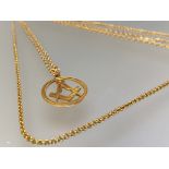 A 9ct gold Masonic pendant, modelled as a compass and set square, on an unmarked tracelink chain;