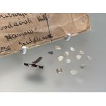 A group of thirteen loose uncut diamond points (13).