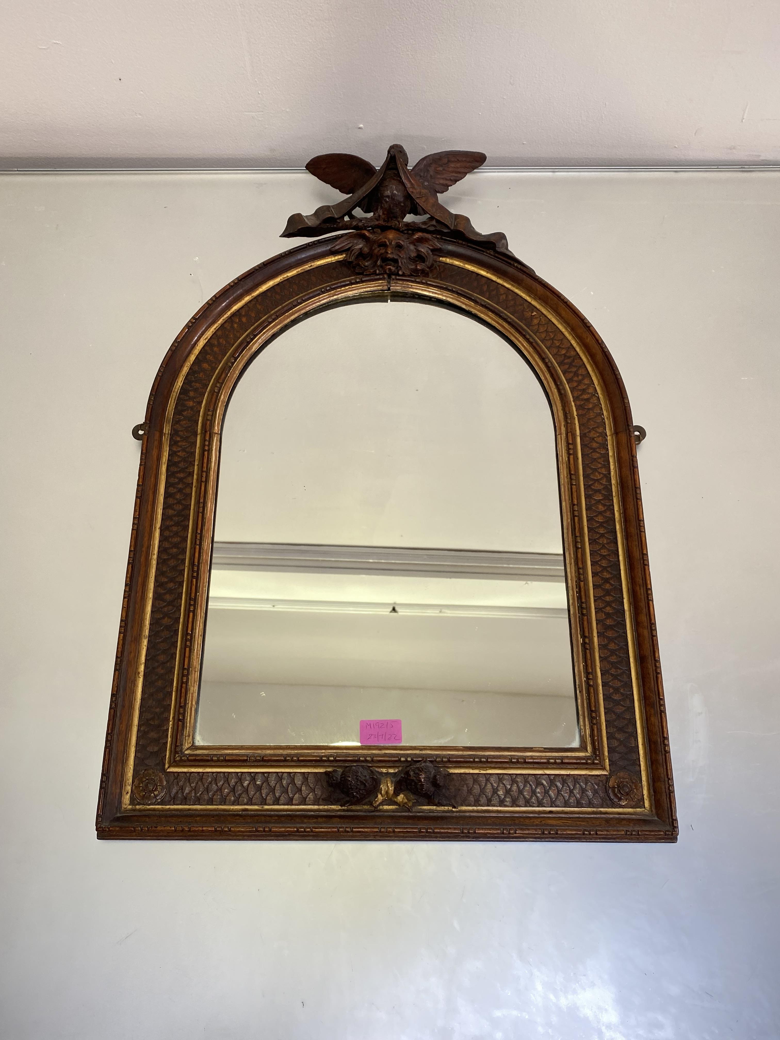A carved walnut and parcel-gilt arched frame, now incorporating a mirror plate, 19th century, the - Image 2 of 3