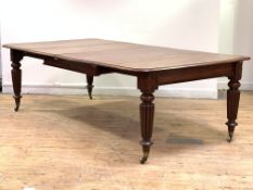 A William IV mahogany extending dining table, the rectangular top with rounded corners and moulded