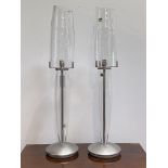 John Rocha for Waterford, a pair of "Seal" lamps, each in clear glass with brushed nickel base.