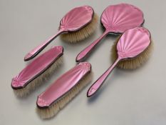 A George V silver and pink guilloche enamel dressing table set, Walker & Hall, Sheffield, 1932, 1933
