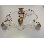 An Art Nouveau style brass rise and fall twin-light ceiling light, in the manner of W.A.S. Benson,