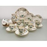 A rare Belleek First Period ring-handled ivory ware tea service in the Convolvulus pattern,