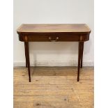 A George III mahogany tea table, circa 1800, the satinwood banded fold over top above a strung