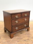 A George III mahogany chest, circa 1800, of small proportions, the figured top with moulded edge