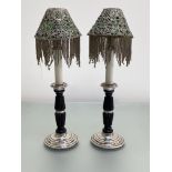A pair of silver-mounted mahogany candlestick lamps, each with silver stepped circular base and