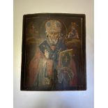 Russian School, an icon depicting a Saint in benediction, holding a bible, crowned within a halo,