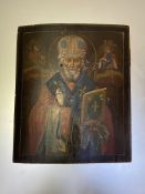 Russian School, an icon depicting a Saint in benediction, holding a bible, crowned within a halo,