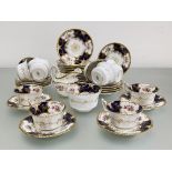 A Coalport Batwing 2665 pattern tea service, c. 1900, comprising: eleven cups, twelve saucers,