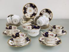 A Coalport Batwing 2665 pattern tea service, c. 1900, comprising: eleven cups, twelve saucers,