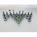 An Indian enamel on white metal chess set, one side green, the other blue, modelled as figures