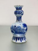 A small Dutch Delft blue and white "Garlic" neck vase, late 18th/early 19th century, painted with