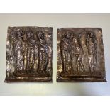 A pair of white metal mounted relief panels reproducing elements from The Reliquary of St.