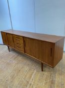 Nils Jonsson for Troeds, a Scandinavian long teak sideboard, 1960's, fitted with five graduated