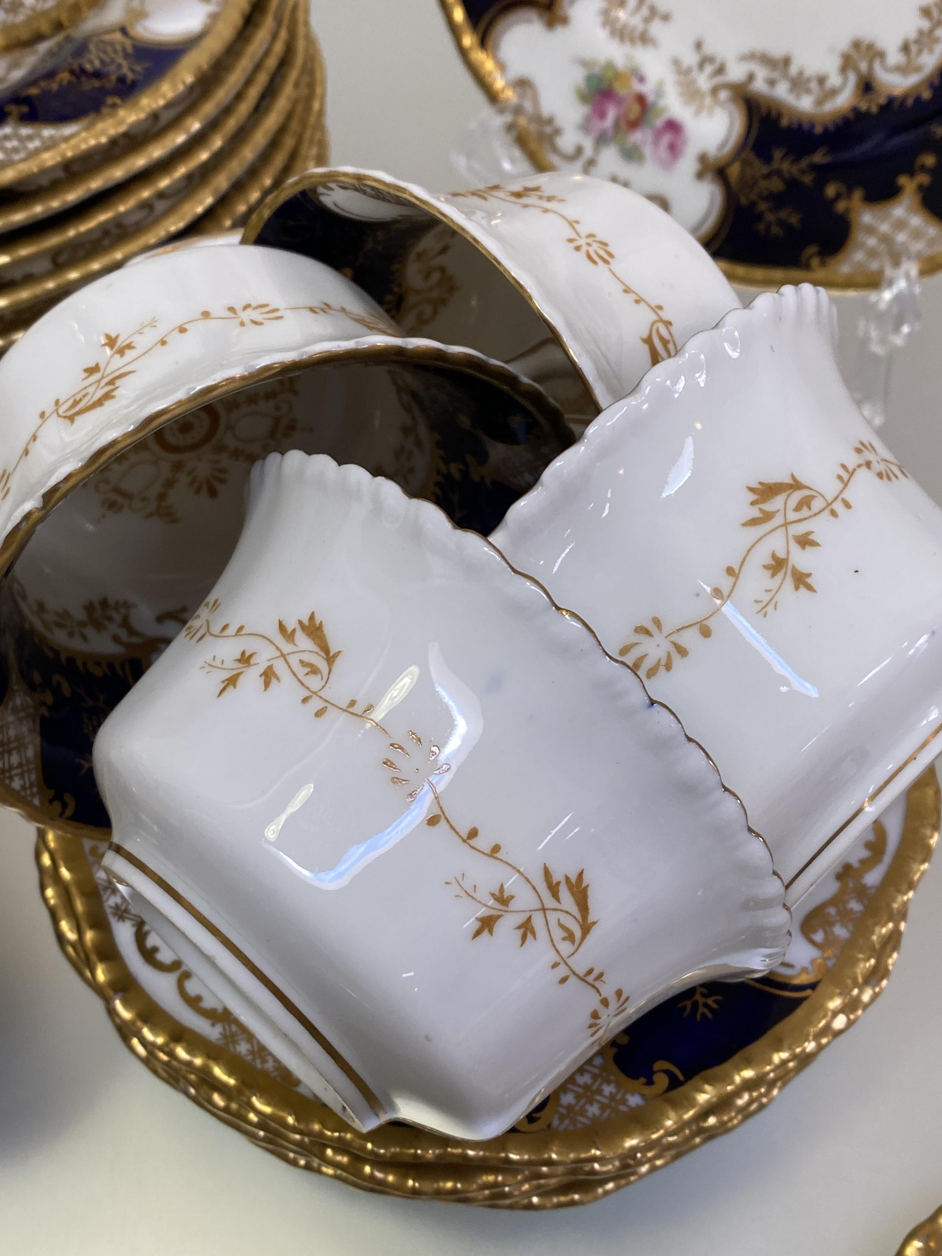 A Coalport Batwing 2665 pattern tea service, c. 1900, comprising: eleven cups, twelve saucers, - Image 4 of 7