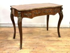 A kingwood bureau plat in the Louis XV taste, 20th century, of serpentine outline, the marquetry top