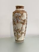 A large Japanese Satsuma vase, c. 1900, of shouldered baluster form, elaborately painted and gilt
