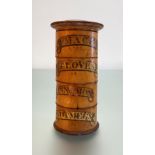 A late 19th century treen spice tower, of tapering cylindrical form, with four named sections, "