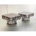 A pair of Indian large white metal capitols of Corinthian type, each gadroon and floral moulded