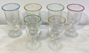 A partial set of Lindean Mill drinking glasses, comprising four goblets and two smaller wines,