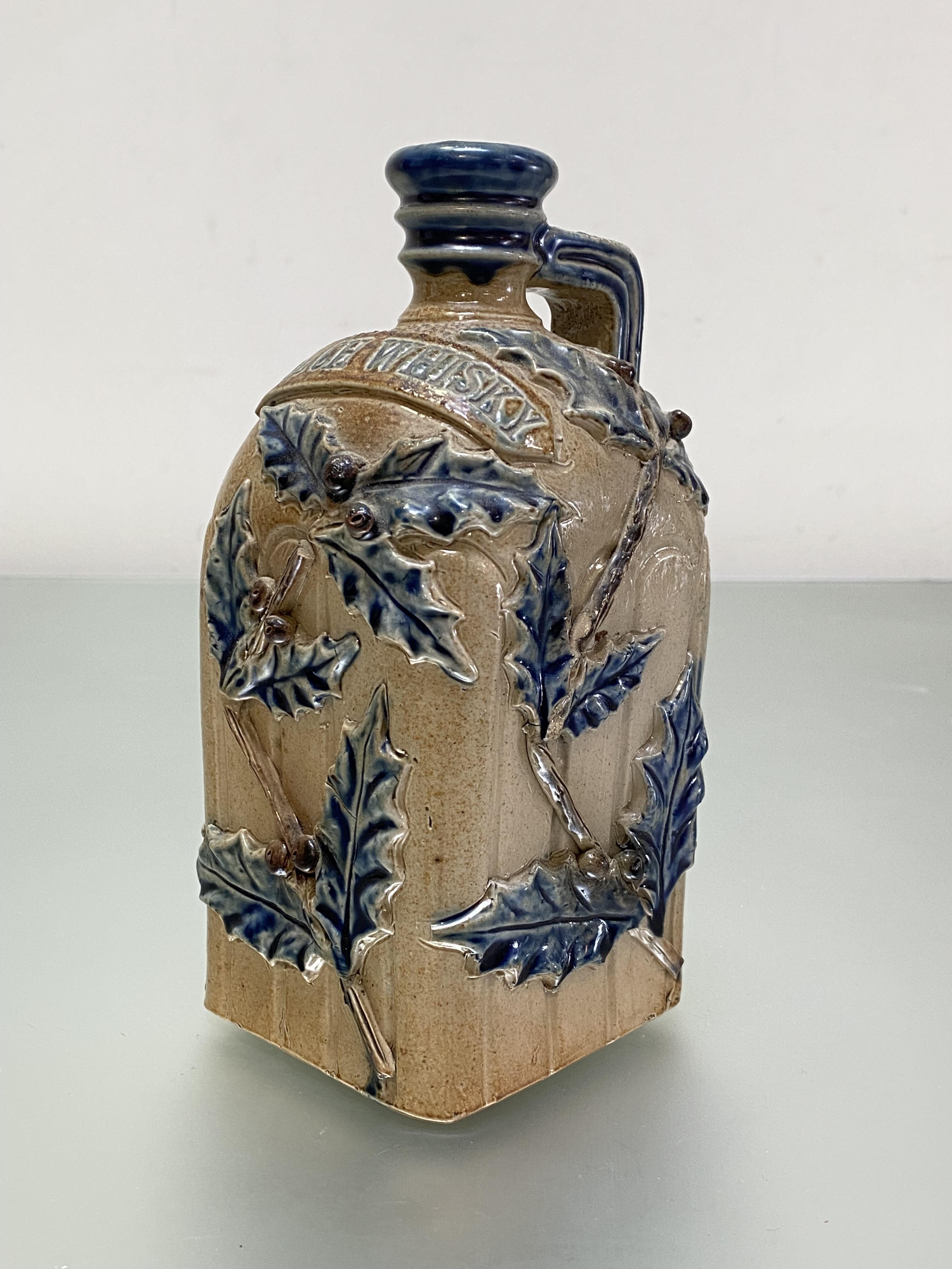 An unusual stoneware Scotch Whisky decanter, late 19th century, probably Doulton Lambeth, of