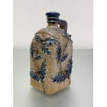 An unusual stoneware Scotch Whisky decanter, late 19th century, probably Doulton Lambeth, of