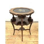 An Edwardian rosewood book table, the serpentine top centred by a Pietra Dura panel, inlaid with