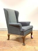 Whytock and Reid, a walnut framed wingback armchair of small proportions in the Georgian taste,