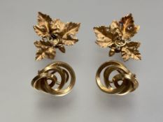 A pair of 9ct gold earrings, each modelled as vine leaves and grapes, the screw post fittings