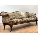 A William IV rosewood framed sofa, the serpentine crest rail over back arms and seat upholstered