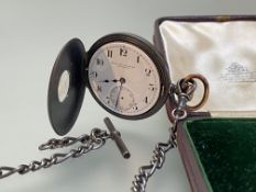 A late 19th century yellow-metal mounted gun metal half hunter pocket watch, the white enamel dial