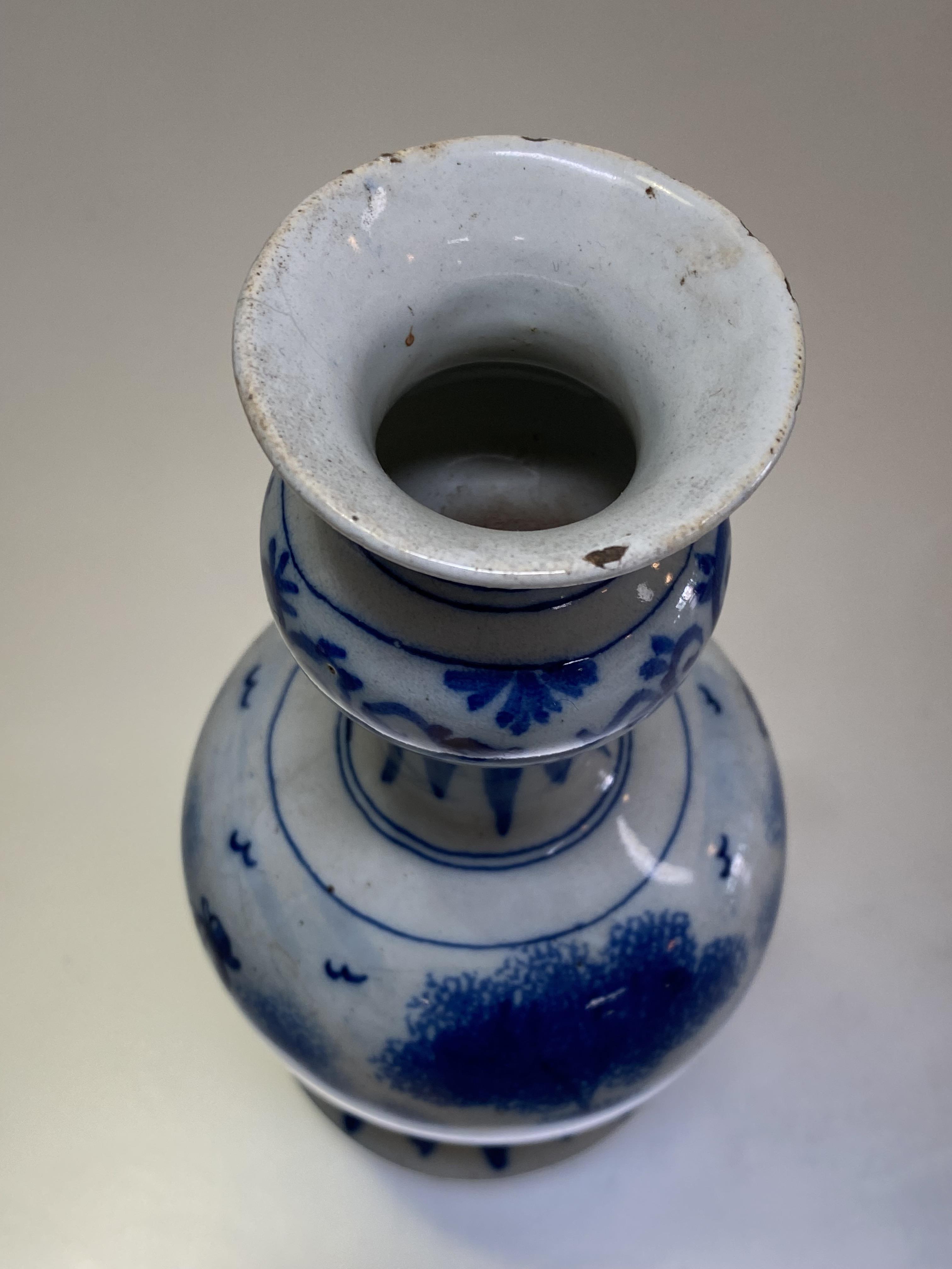 A small Dutch Delft blue and white "Garlic" neck vase, late 18th/early 19th century, painted with - Image 3 of 3