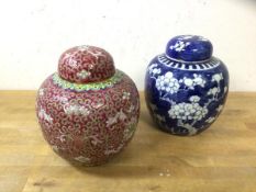 Two Chinese ginger jars, one blue and white with prunus decoration, lid a/f, measures 15cm, the