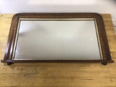 A late 19th early 20thc over mantel mirror with the rectangular glass within a rosewood frame with