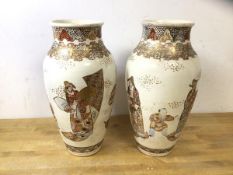 A pair of satsuma baluster shaped vases, each measures 33cm high