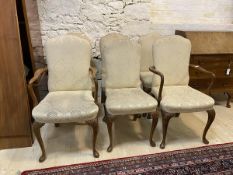 A set of six (four + two) Queen Anne style early 20thc walnut dining chairs upholstered in ivory