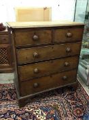 An early 19thc mahogany chest of drawers the top with moulded edge over two short drawers and