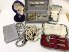 A mixed lot including silver medal for D Gillespie, Epns baby spoon and food pusher, cigarette case,