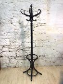 A modern ebonised coat stand with a bee hive finial, measures 186cm high