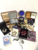 A quantity of costume jewellery including necklaces, brooches, bracelets, polished stone, abalone